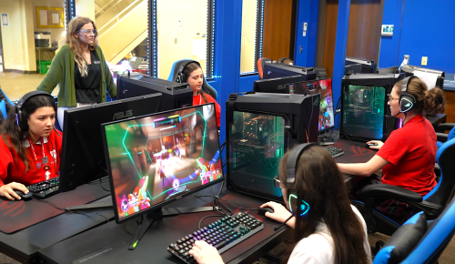 Studens playing at PC stations together